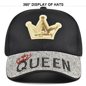 Black baseball cap with golden crown patch and rhinestone QUEEN letters on the brim