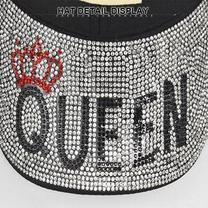 Sparkling rhinestone baseball cap with QUEEN text and red crown emblem details