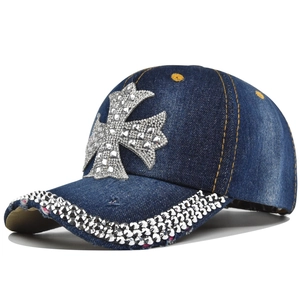 Dark blue denim baseball cap with silver rhinestone cross and studded brim accents