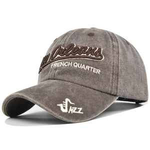 Close-up of 3D New Orleans embroidery on vintage washed cotton baseball cap