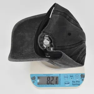 Detailed view of the 82.1g weight measurement for the washed cotton baseball cap