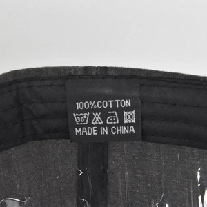 Close-up of internal 100% cotton label and neat stitching on vintage baseball cap