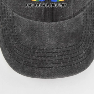 Detail view of washed dark grey cotton baseball cap brim with reinforced stitching