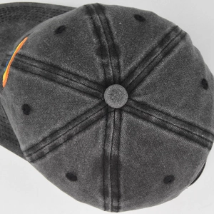 Top view detail of dark grey washed cotton baseball cap with rainbow embroidery