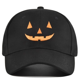 Black cotton baseball cap featuring an orange embroidered Halloween pumpkin face