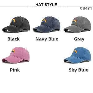 Flat lay of colorful washed cotton baseball caps with rainbow embroidery detail