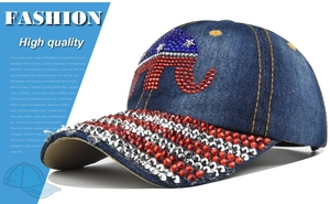 Detail of dark blue denim baseball cap featuring a rhinestone elephant American flag motif