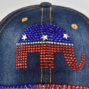 Denim baseball cap featuring a patriotic rhinestone elephant design with metallic stars