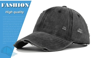 Detailed side view of washed dark grey vintage baseball cap with distressed hole details