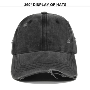 Vintage washed black distressed baseball cap with ripped details and retro denim style