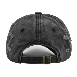 Detailed back view of distressed gray baseball cap with adjustable bronze metal buckle