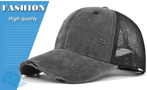 Detail of distressed brim and breathable mesh on dark grey washed vintage trucker hat