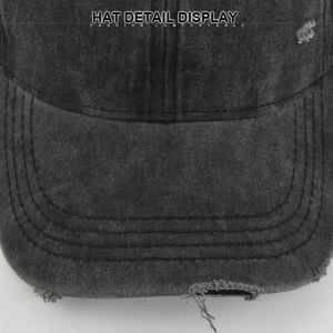 Macro detail of distressed vintage baseball cap with washed denim and torn brim edges