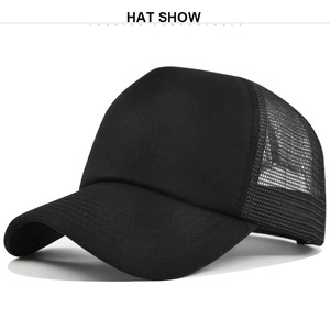 Close-up of black breathable mesh back and solid fabric crown on the trucker baseball cap