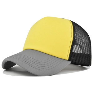 Detail of 5-panel trucker hat with yellow front and breathable black mesh back