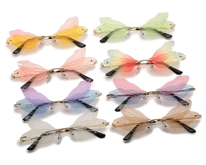 Detail of multi-color rimless dragonfly wing sunglasses with gold metal frame