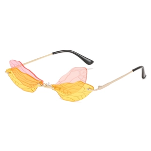 Chic butterfly wing sunglasses with pink and yellow gradient lenses and gold frames