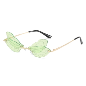Dragonfly wing sunglasses with green tinted lenses and gold metal frames for party wear