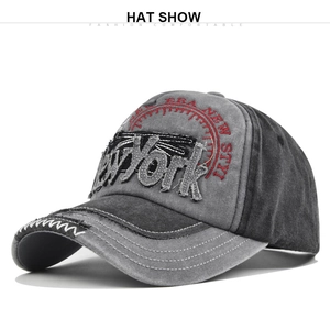 Detail view of New York embroidery on washed two-tone vintage baseball cap