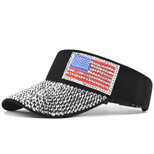 Black sun visor hat with American flag patch and sparkling rhinestone brim detail