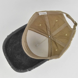 Detailed interior of vintage washed cotton baseball cap with worn edge effect