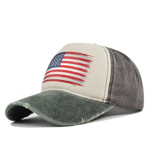 Detailed view of the vintage American flag print on a washed distressed trucker hat