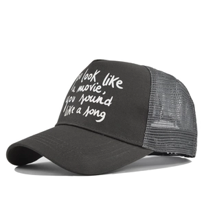 Detail of truck cap mesh back and You Look Like a Movie printed text in white