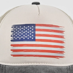 Macro view of vintage US flag print and washed texture on the front of the baseball cap