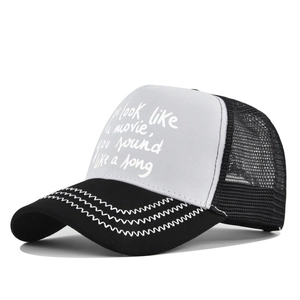 Detail of printed text you look like a movie and mesh panels on the trucker hat