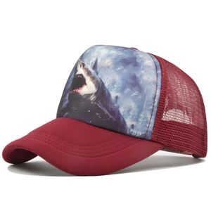 Detail of burgundy trucker hat with shark print and breathable red mesh side panels