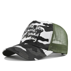Detail of camoflauge trucker hat with screen-printed artistic quote and mesh back