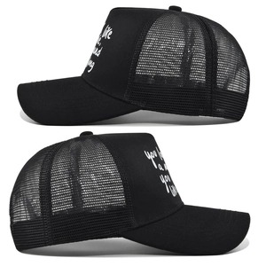 Detail view of breathable black mesh trucker hat with white script logo print on the front
