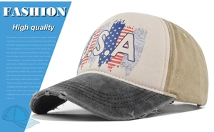 Close-up of distressed washed canvas baseball cap with USA embroidery and worn brim details