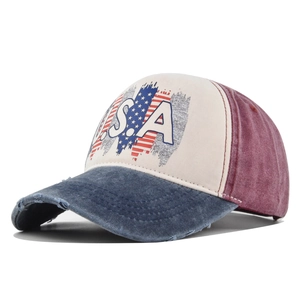 Detailed close-up of washed distressed baseball cap with USA embroidery and star flag