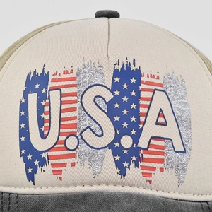 Front view of distressed USA baseball cap with vintage flag print and cotton fabric