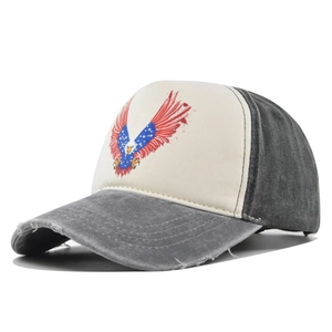 Macro shot of distressed grey denim baseball cap brim with vintage frayed edge detail