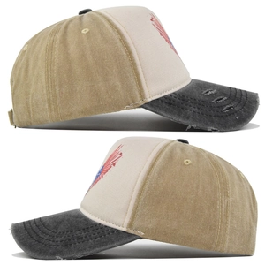 Detail view of the vintage washed cotton baseball cap with worn edges and two-tone panels