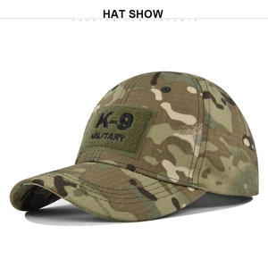 Close-up of jungle camouflage tactical baseball cap with K-9 Military velcro patch
