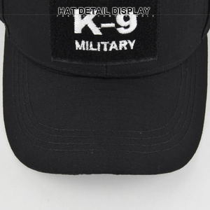 Close-up of K-9 Military embroidery and reinforced stitching on black tactical cap