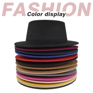 Flat brim wool felt fedora hats stacked in multiple vibrant colors for a classic retro style