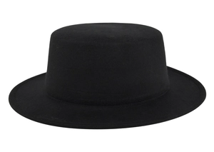 Detail view of a minimalist black felt flat top boater hat with a wide structured brim