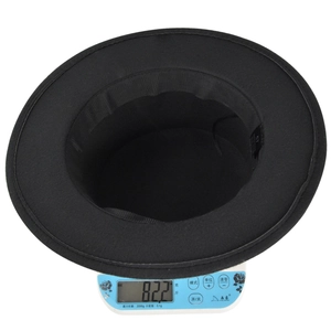 Detailed view of lightweight black wool felt fedora hat weighing 82 grams on a scale