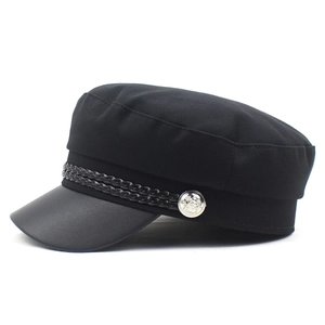 Women's black baker boy hat with faux leather brim and silver button detail