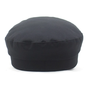Detail of black navy cap with smooth leather brim and premium twill fabric stitching