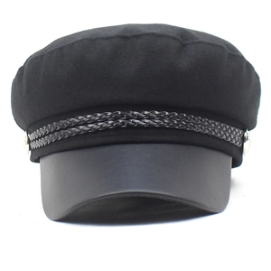 Classic black newsboy hat with wool crown, leather brim and braided decorative strap
