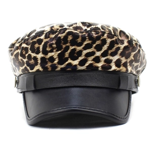 Stylish leopard print newsboy cap with black PU leather visor and metallic button accents