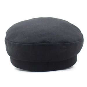 Detail of the high-quality wool fabric and stitching on this classic black newsboy hat
