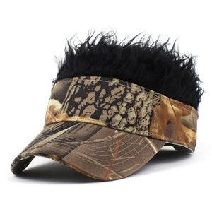 Close-up of camouflage sun visor hat with creative black faux hair wig extension