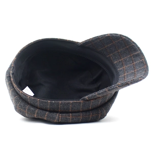 Casquette gavroche classique pour femme avec motif à carreaux orange et gris chic