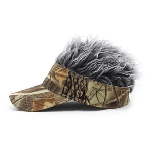 Detail view of camouflage sun visor hat with creative curly grey synthetic hair topper